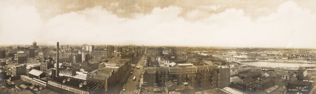 Panoramic view looking east along Collins Street, showing McCracken’s Brewery