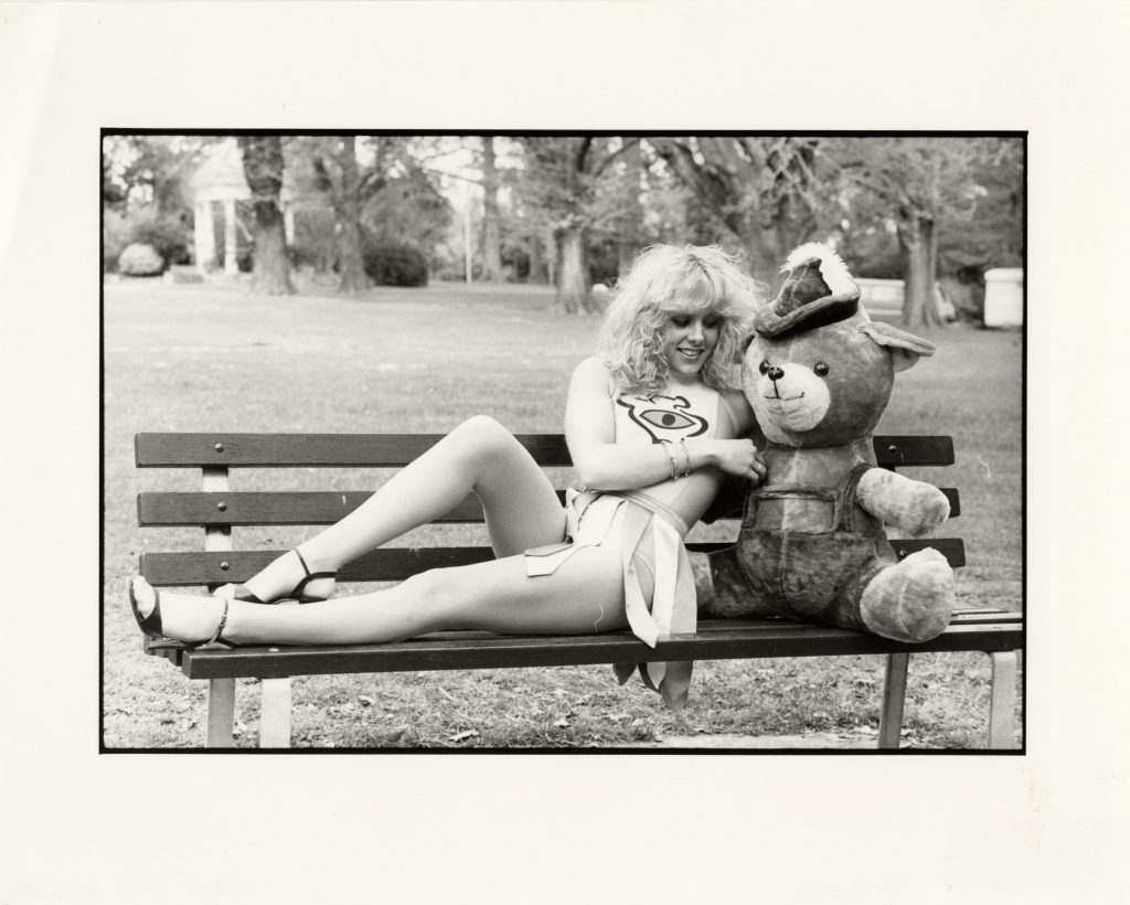 FEIP girl and teddy bear on park bench