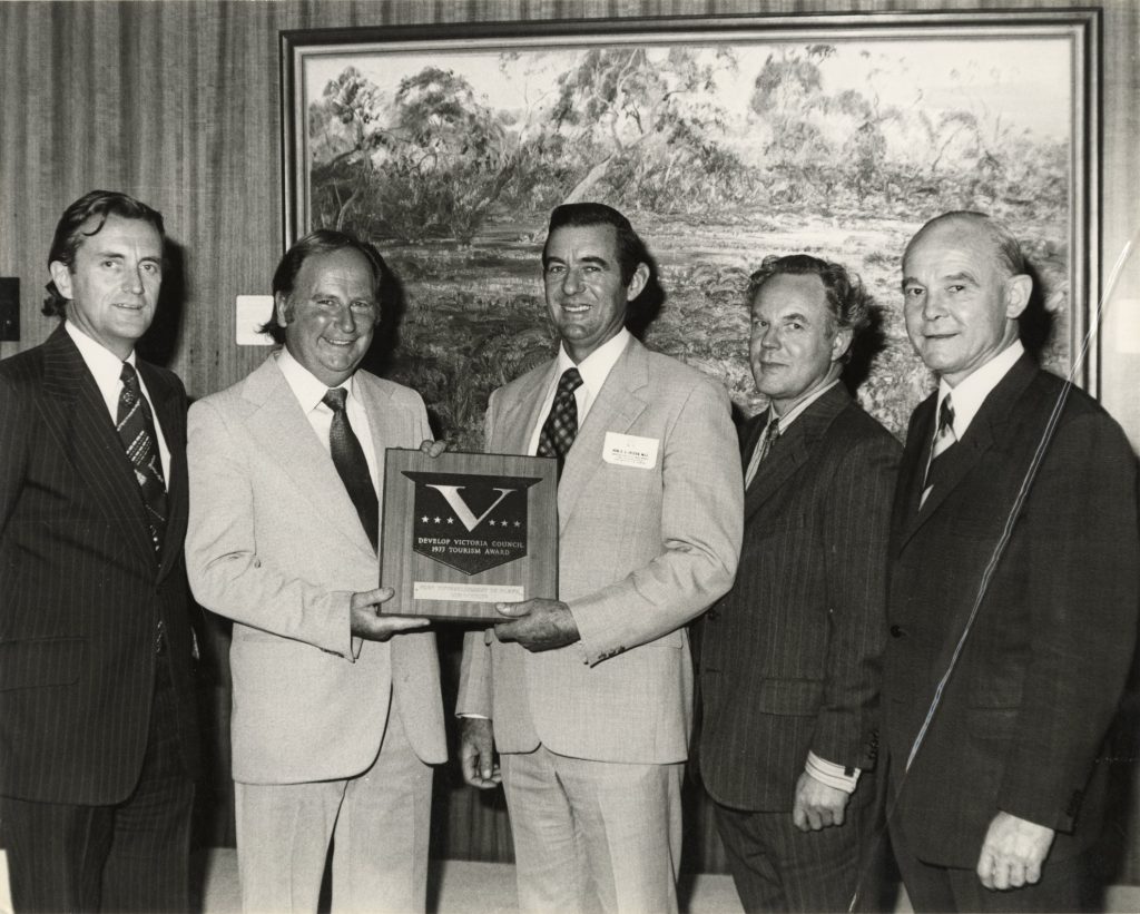 Five men, including Bob Crawford, hold the 1977 Develop Victoria Council Tourism Award