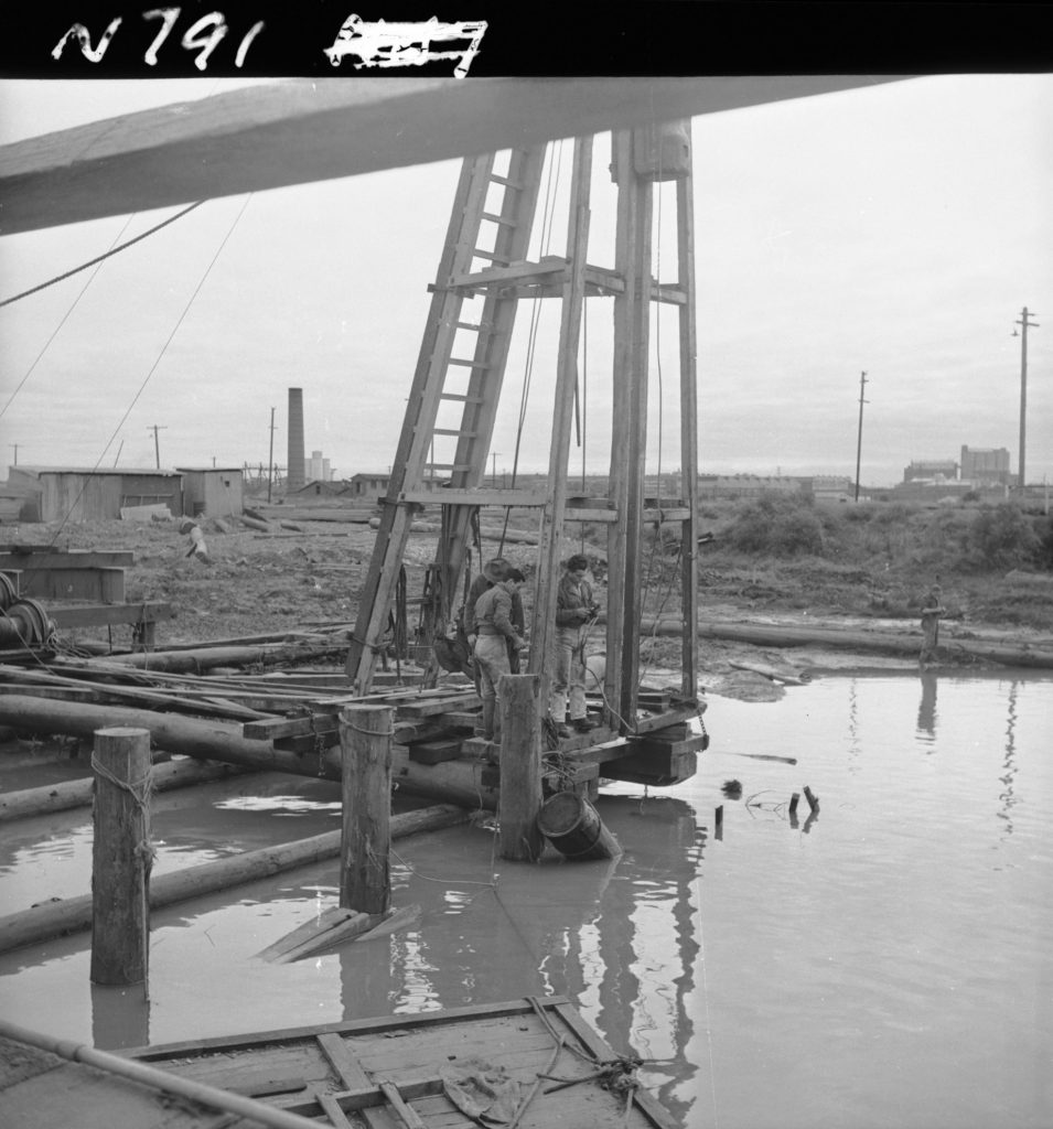 N791 Image showing removal of a damaged pile during construction of the new Coal Canal Bridge on Footscray Road