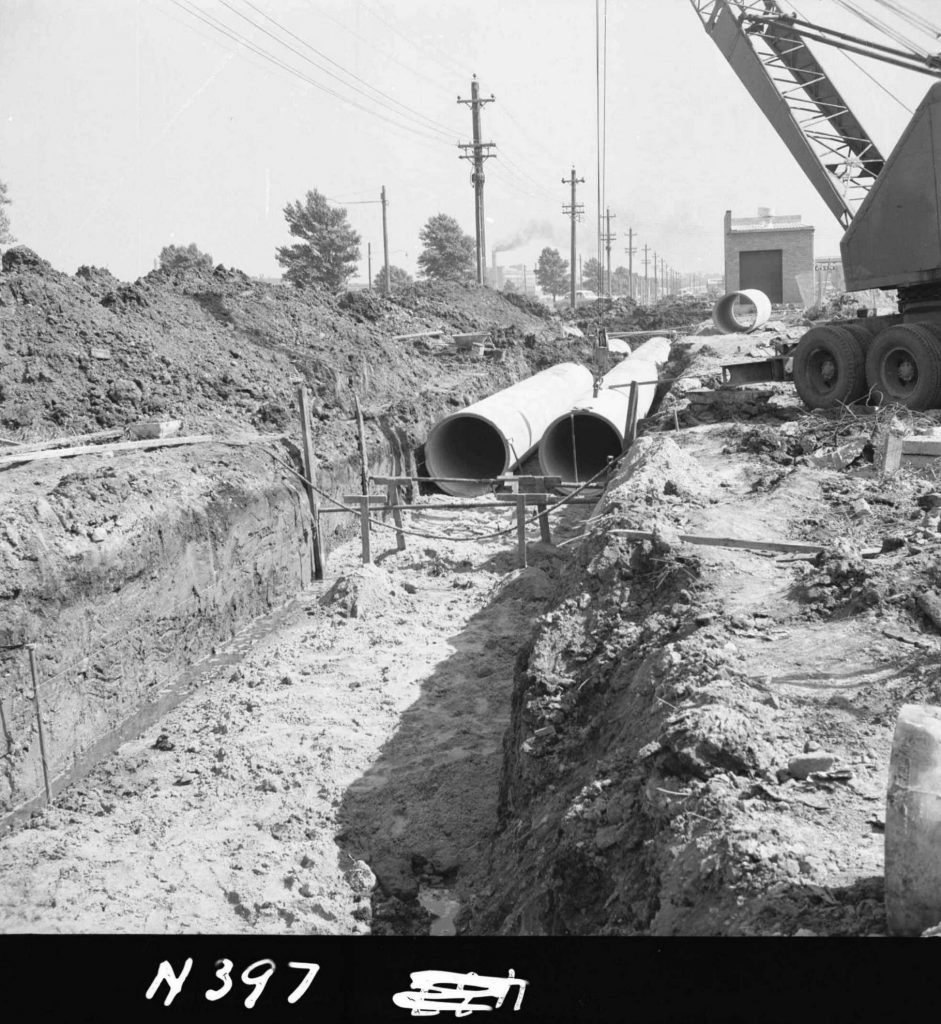 N397 Image showing the use of Acrow props to support trench walls during drain construction on Footscray Road