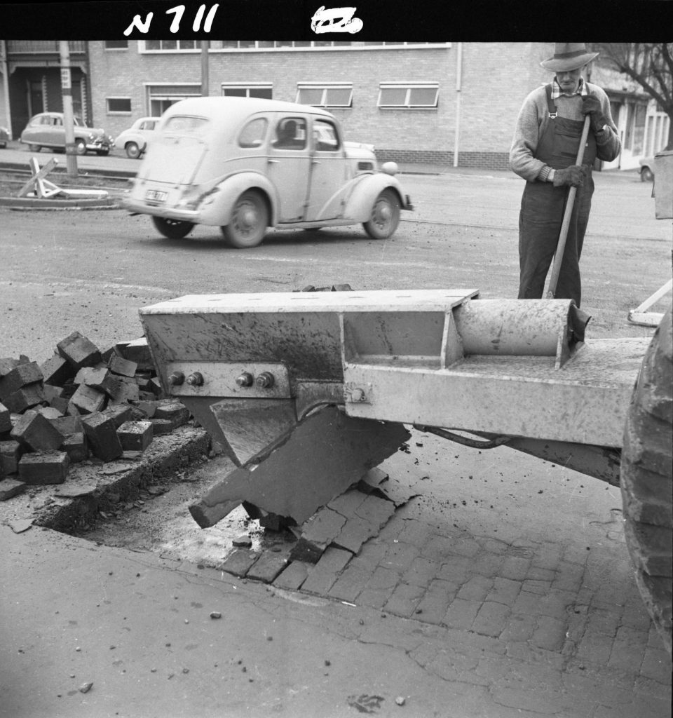 N711 Image showing the start of a run of the ripper attachment of a front end loader