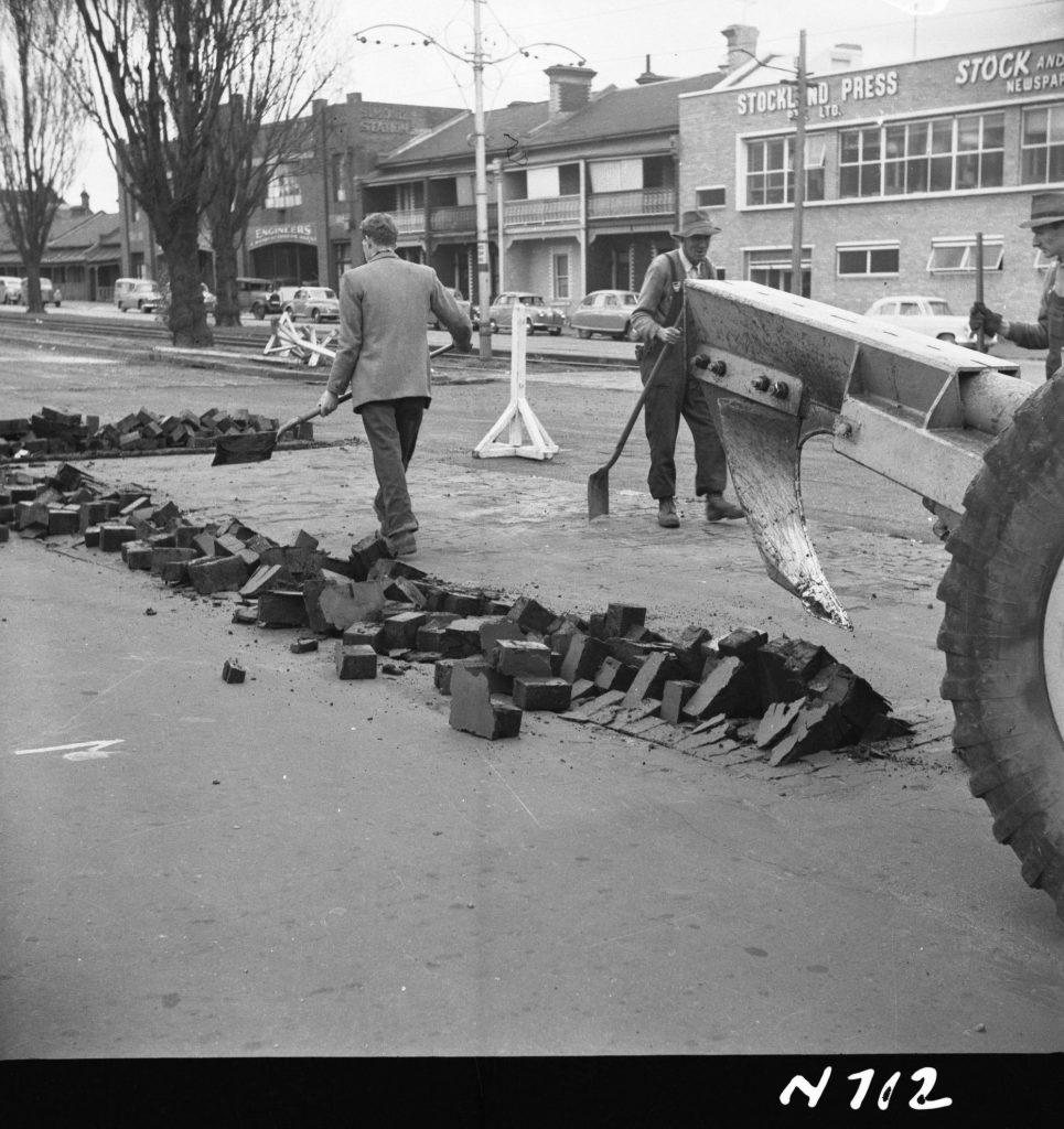 N712 Image showing woodblocks loosened by the ripper blade attachment of a Cranvel front end loader