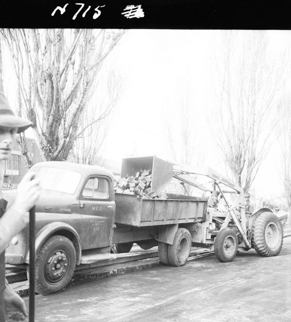 N715 Image showing a Cranvel front end loader loading wood blocks