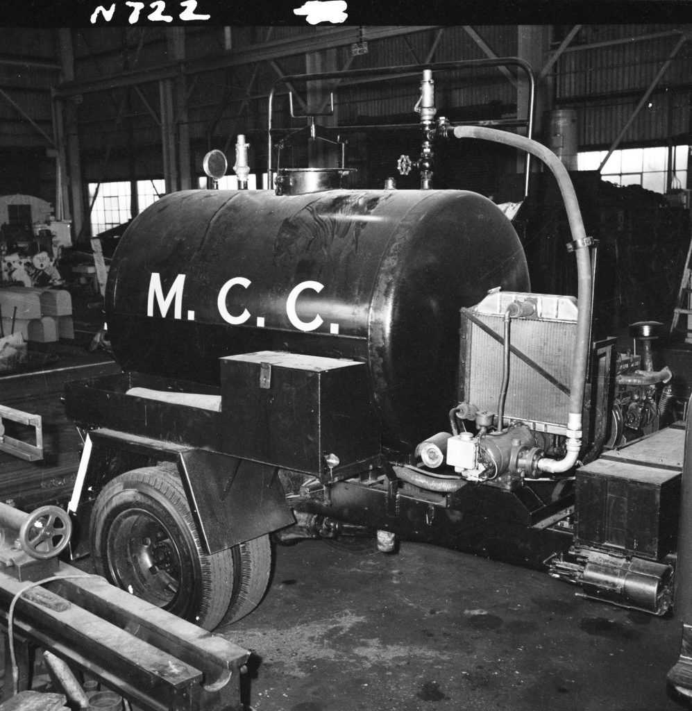 N722 Image showing a 600 gallon emulsion sprayer with an auxilliary engine and air compressor