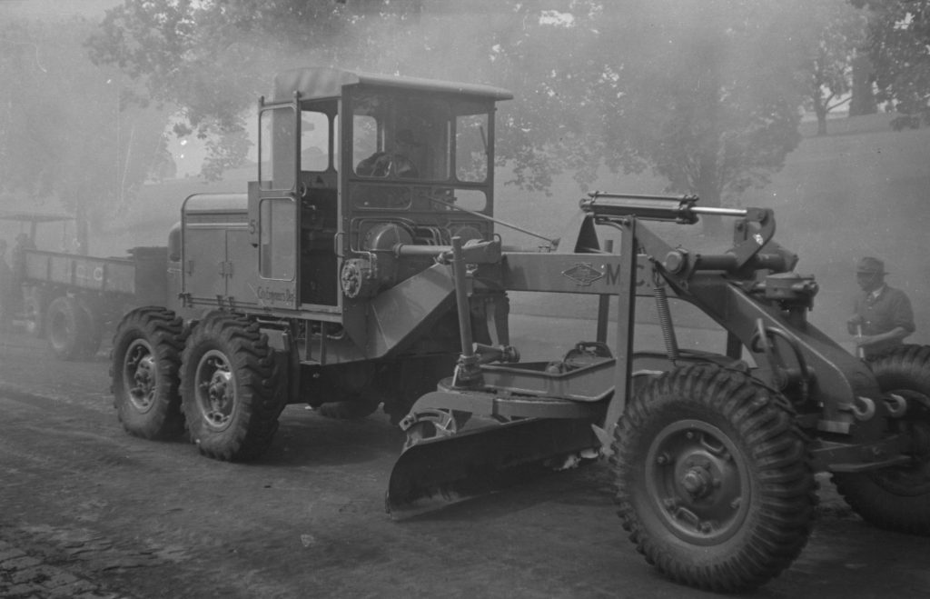 N741 Image showing a roadheater followed up by a grader, in use up until 1954