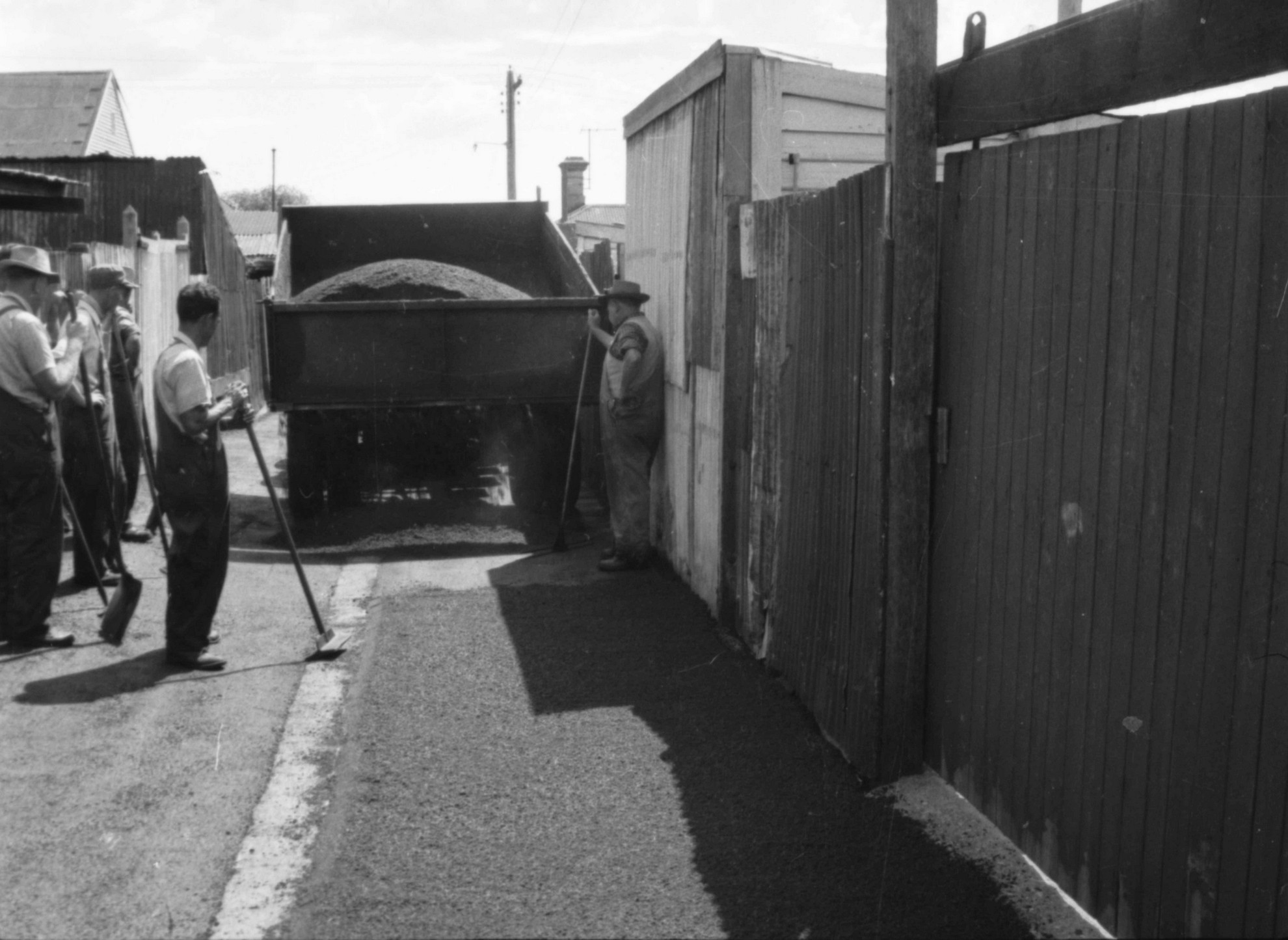 Snorting Asphalt N562 Image showing spreading and rolling of hot mix asphalt in a North ...