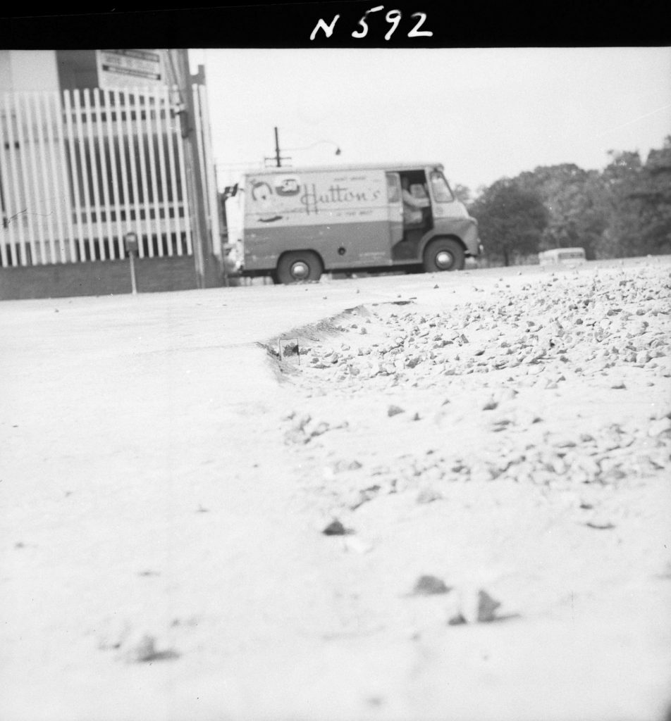 N592 Image showing footpath opening for the Postmaster-General trench at the roadway on the corner of Albert Street and Lansdowne Street, East Melbourne