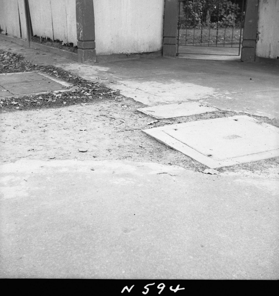 N594 Image showing footpath opening for the Postmaster-General trench on the roadway near the corner of Albert Street and Clarendon Street, East Melbourne