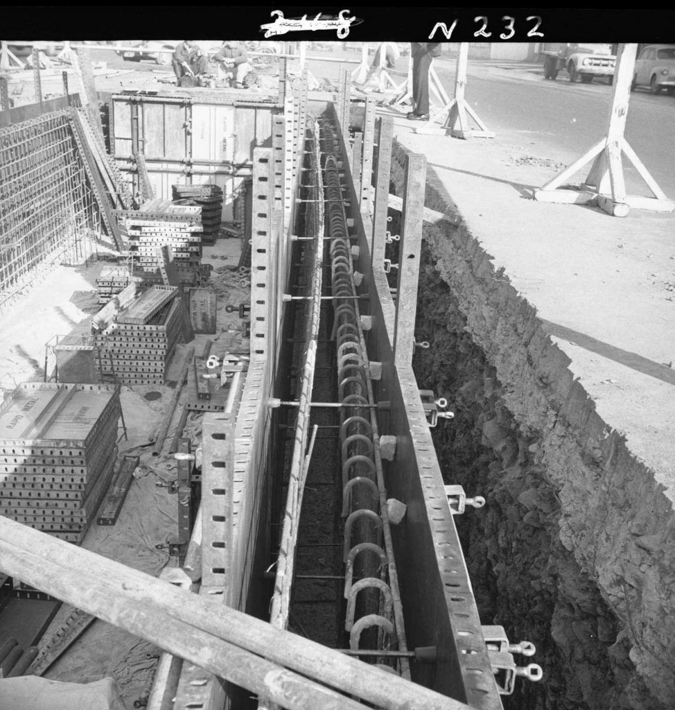 N232 Image showing shuttering ties and reinforcement of shuttering blocks during construction of a weighbridge on Flinders Street