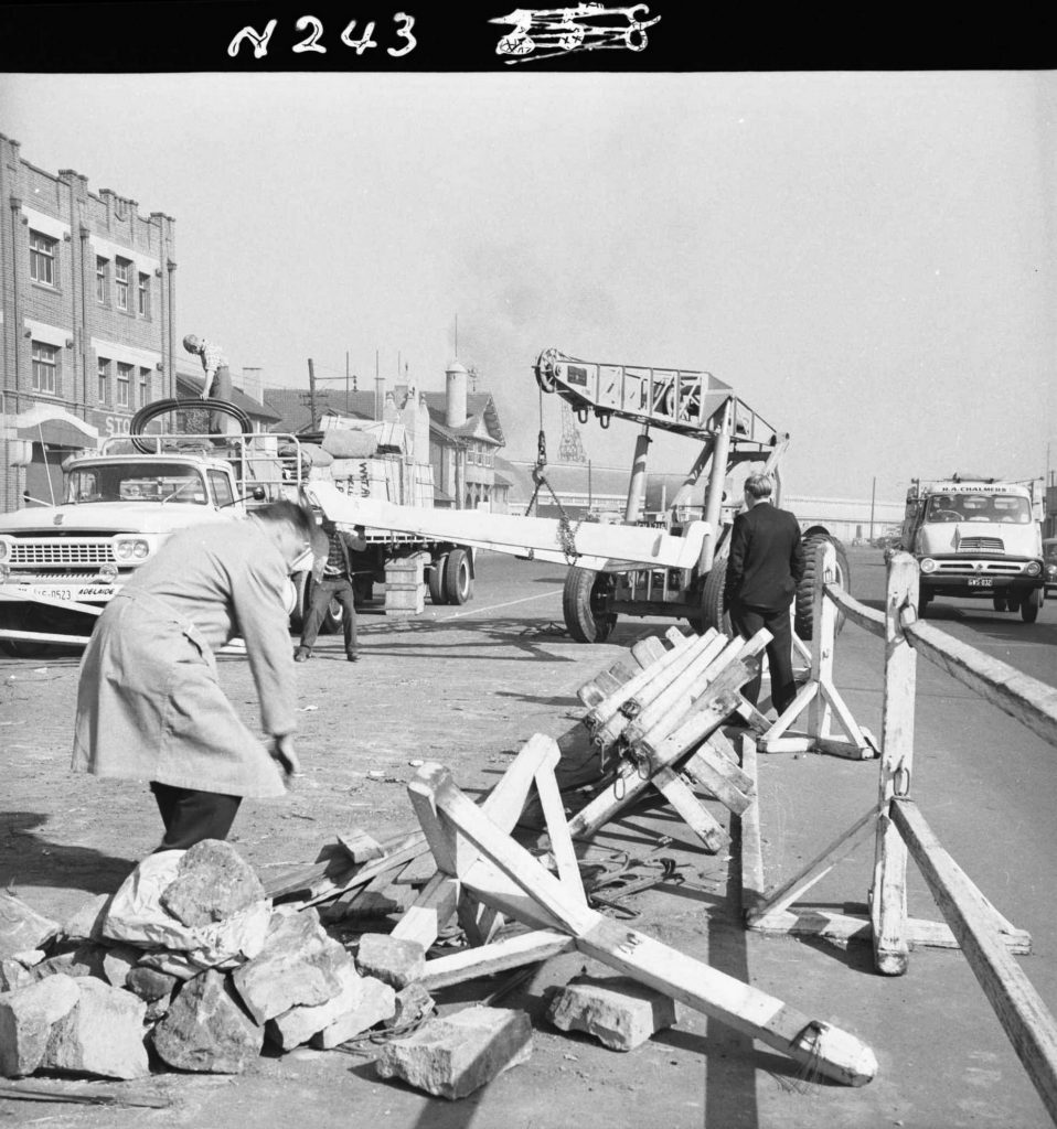 N243 Image showing the arrival of parts for construction of a weighbridge on Flinders Street