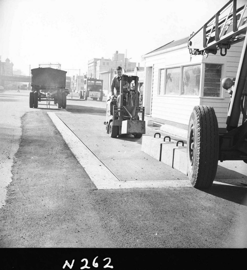 N262 Image showing testing of the completed weighbridge on Flinders Street with half ton weights