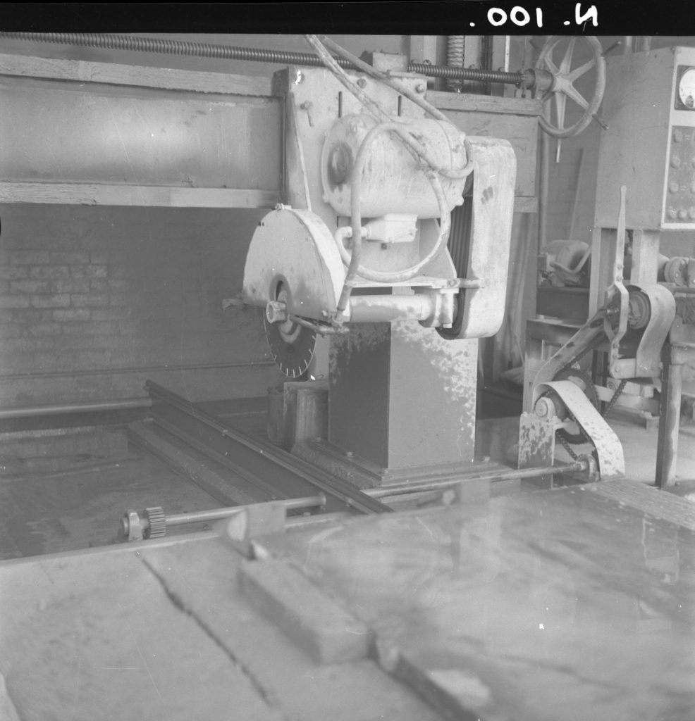 N100 Image showing a stone cutting machine in a masons yard