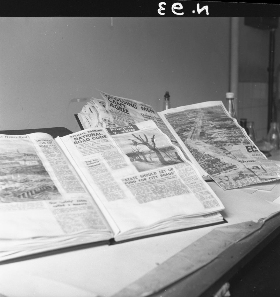 N93 Image showing newspaper clippings pasted into books