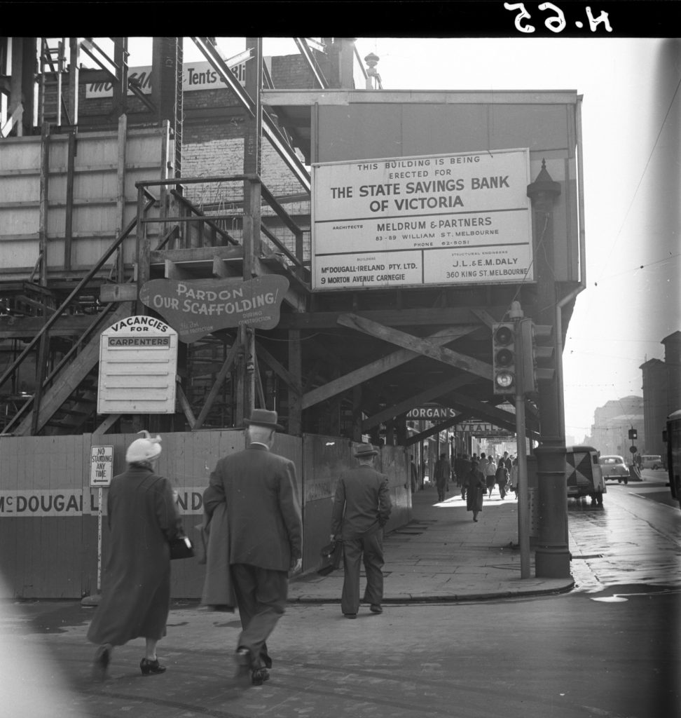 N65 Image showing hoardings on Little Bourke Street, viewed from Swanston Street