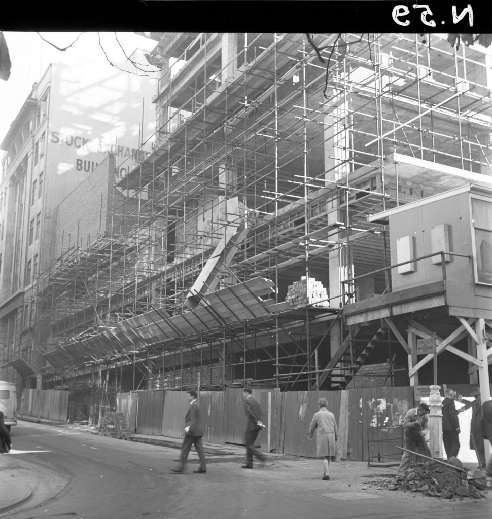 N59 Image showing hoardings around the R.A.C.V. building on Little Collins Street