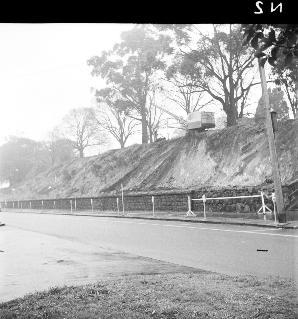 N2 Image showing construction of a block wall around Flagstaff Gardens