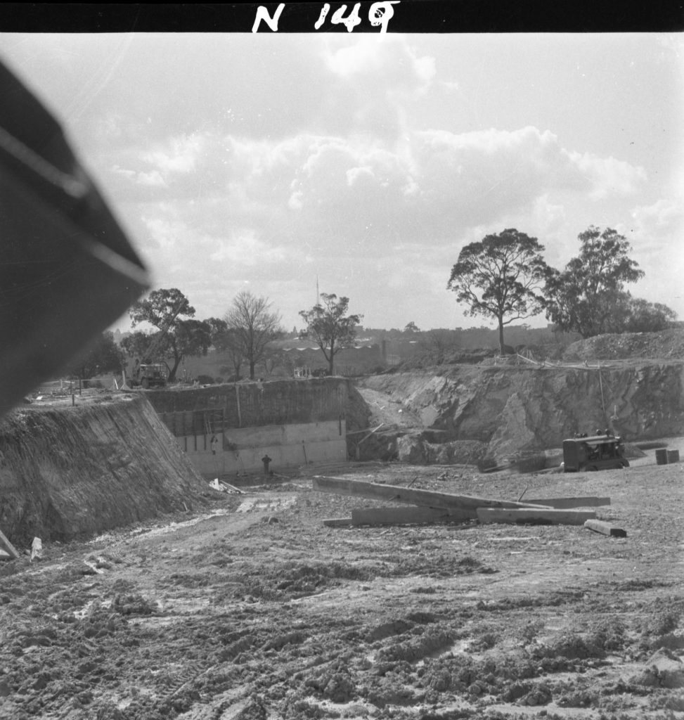 N149 Image showing early excavations and the stage’s back wall during construction of the Sidney Myer Music Bowl