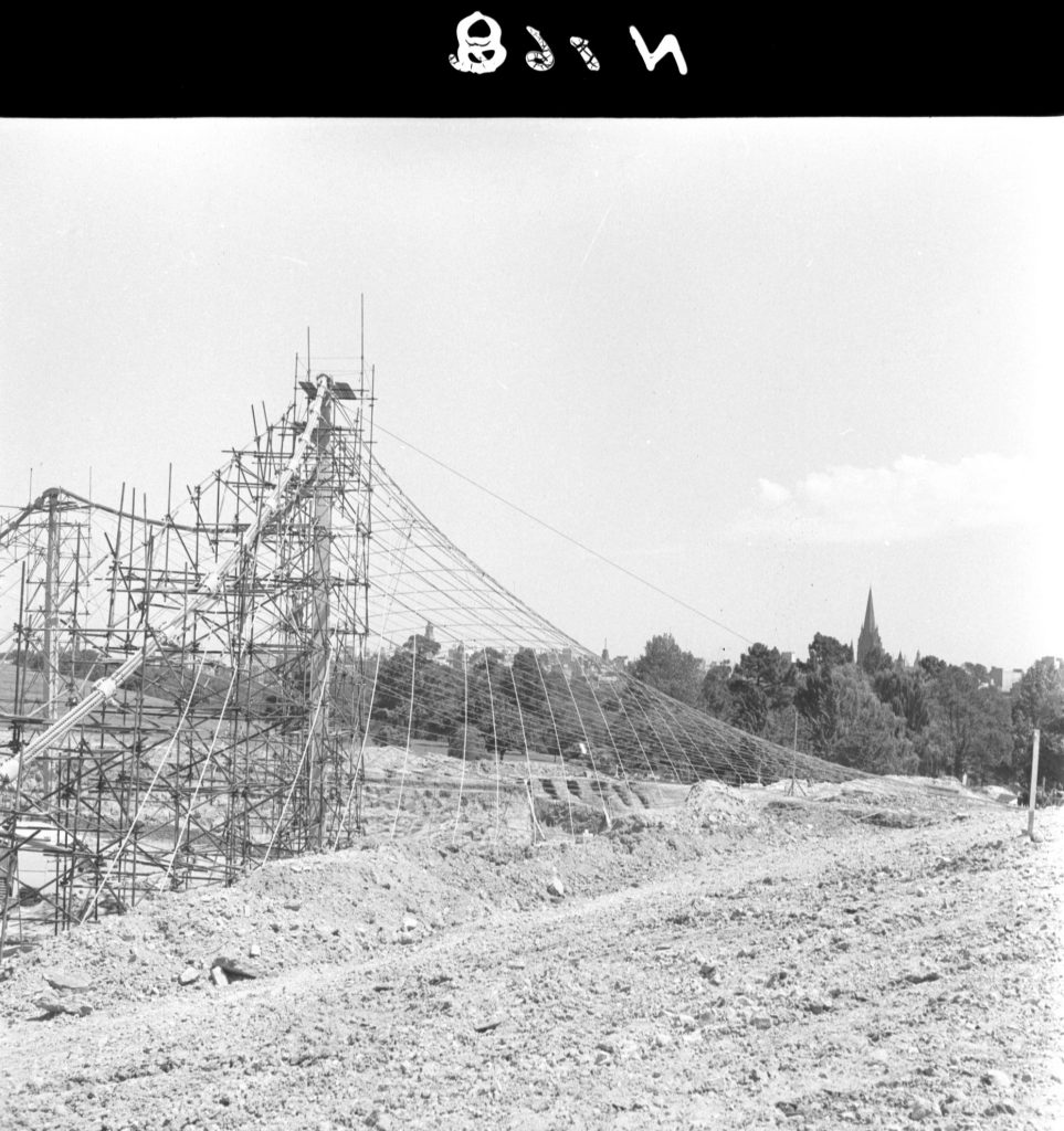 N168 Image showing tying of primary to main cables during construction of the Sidney Myer Music Bowl