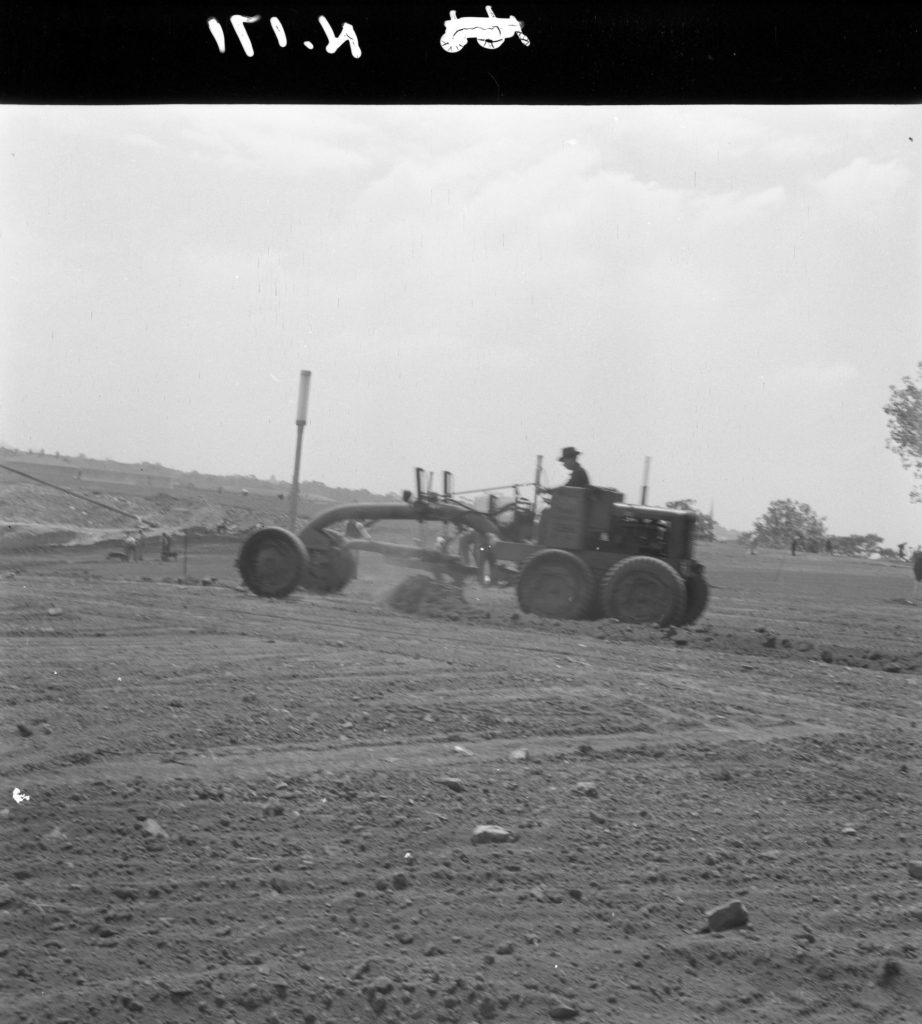 N171 Image showing grading of the topsoil for lawns during construction of the Sidney Myer Music Bowl