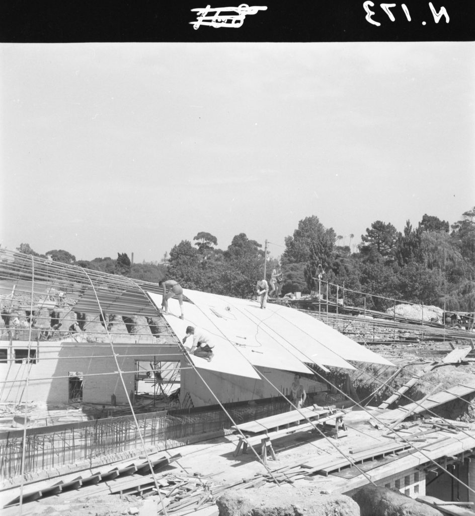 N173 Image showing the first roof sheeting during construction of the Sidney Myer Music Bowl