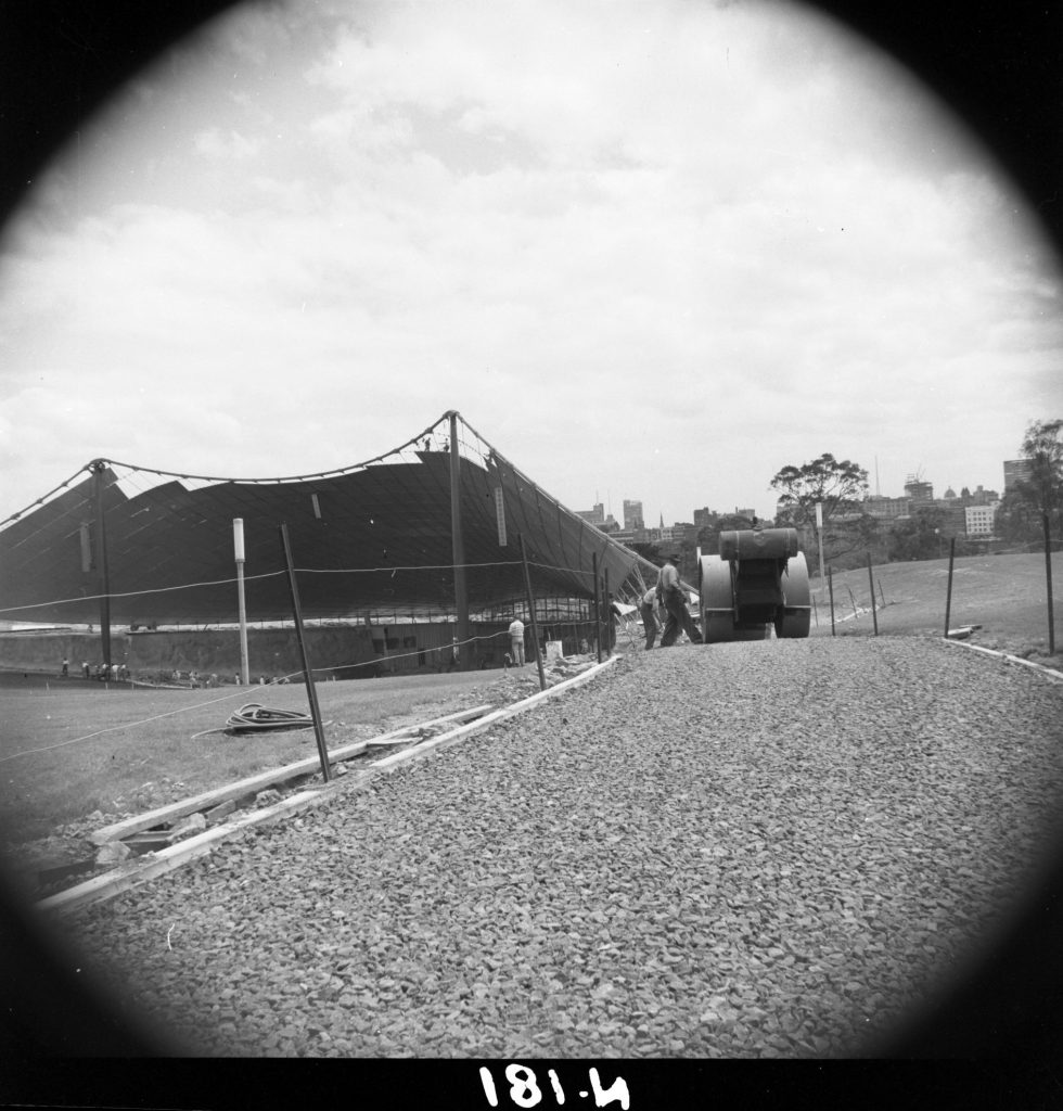 N181 Image showing rolling metal in footpath during construction of the Sidney Myer Music Bowl