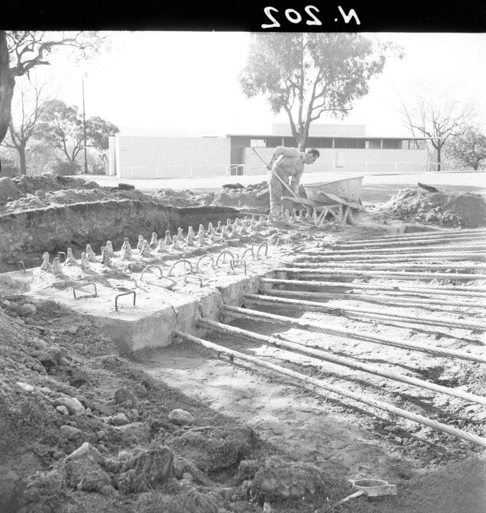 N202 Image showing rust protection for primary cables during construction of the Sidney Myer Music Bowl