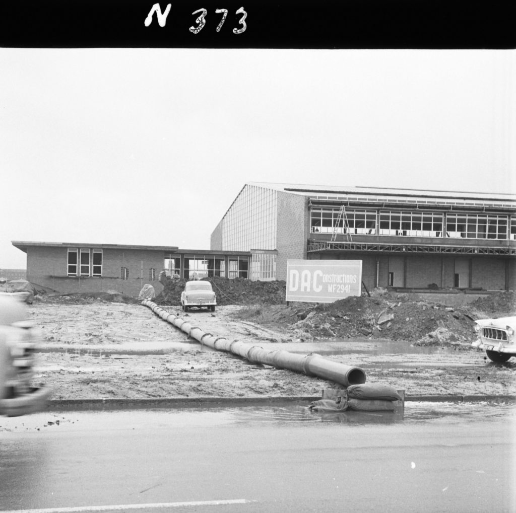 N373 Image showing drainage of water from a trench during sewer construction for the Fish Market on Footscray Road