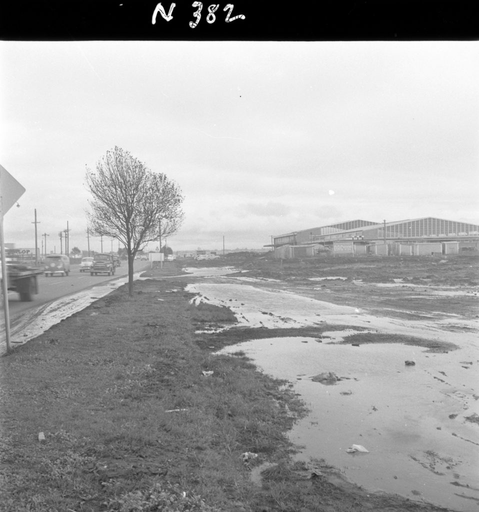 N382 Image showing a future service road flooded after a storm, during construction of the Fish Market on Footscray Road.
N382 Image showing an area flooded during construction of the Fish Market on Footscray Road