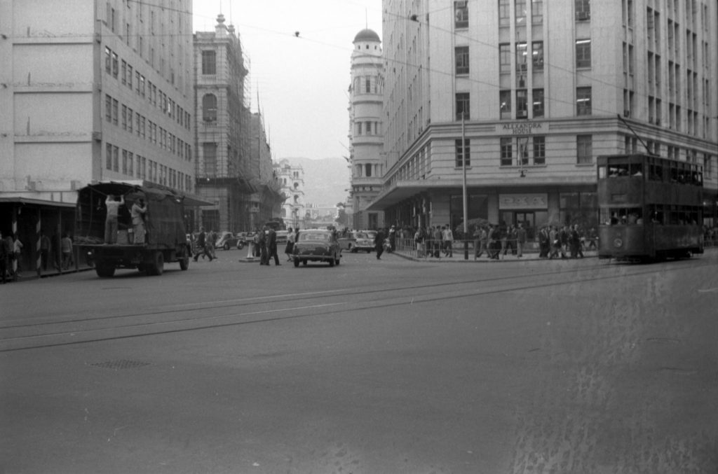 35A-20c Image showing a double-decker tram passing Alexandra House in Hong Kong