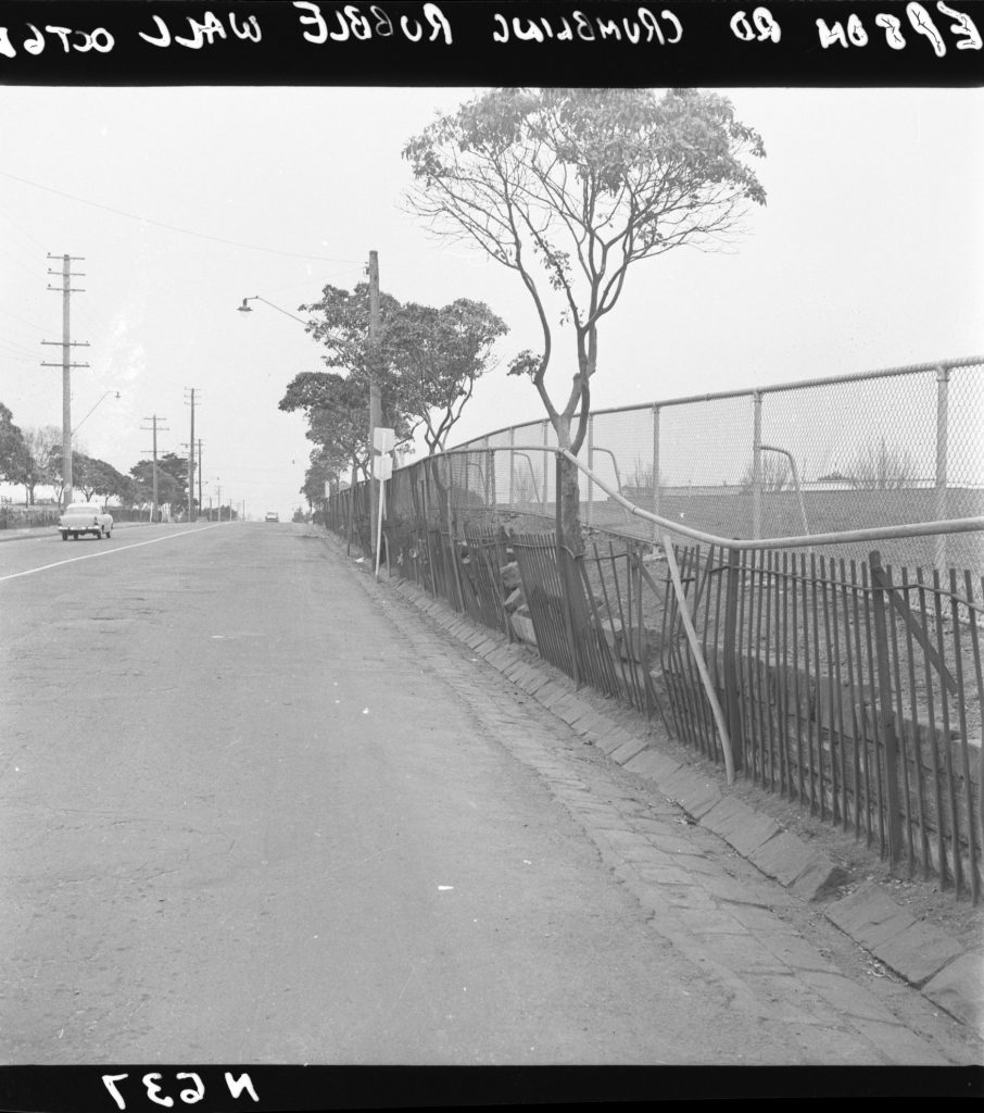 N637 Image showing a crumbling wall along Racecourse Road and Epsom Road