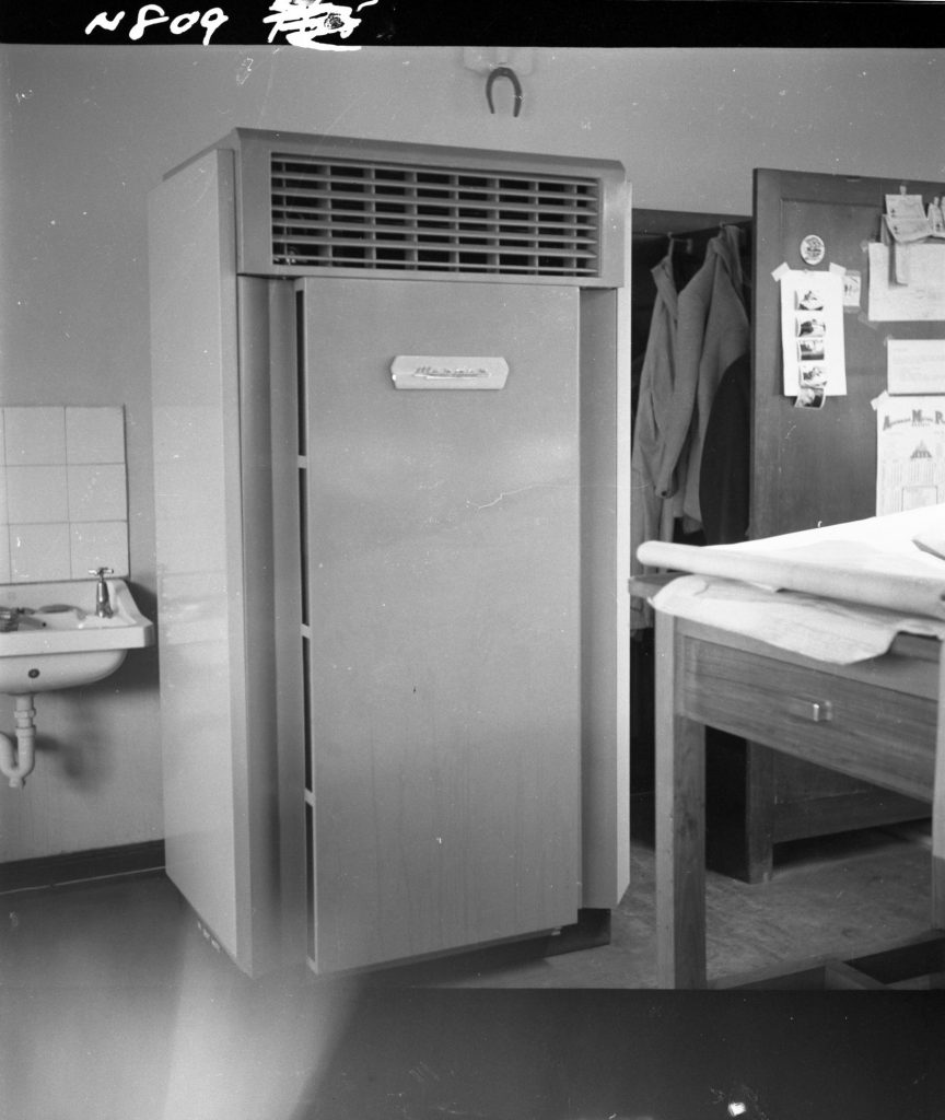 N809 Image showing an air conditioning unit ready for installation in the City Engineers Drawing Office