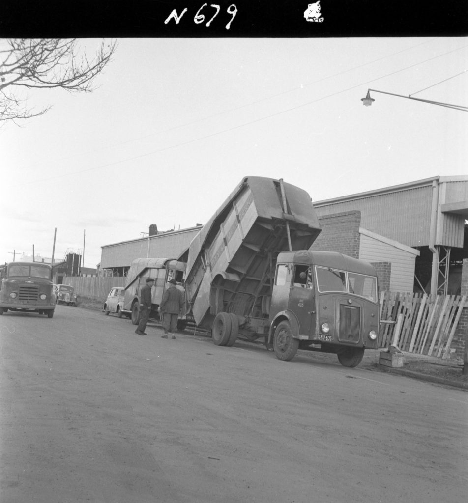 N679 Image showing a Karrier garbage truck in discharge position