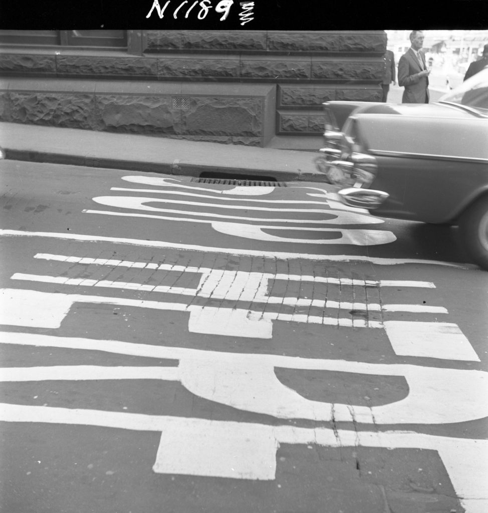 N1189 Image showing the worn wood block road surface on Little Collins Street, outside the Town Hall