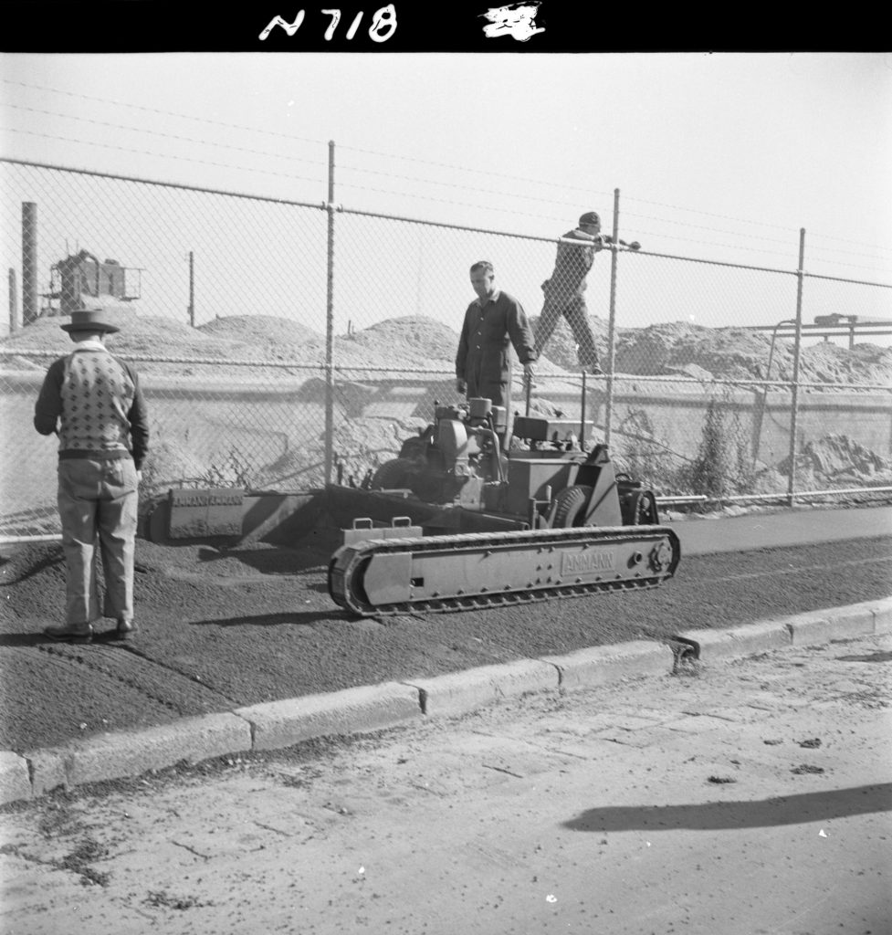 N718 Image showing an Amman footpath paver in operation