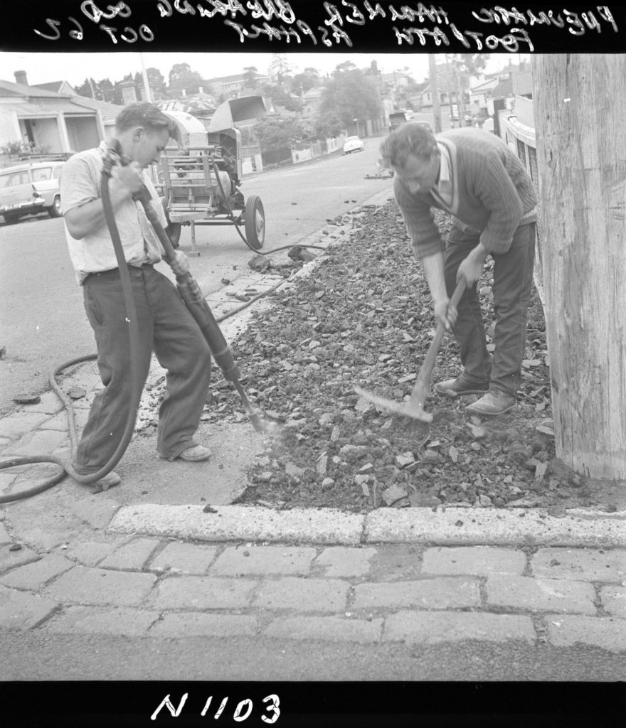 N1103 Image showing breaking of an old asphalt surface footpath