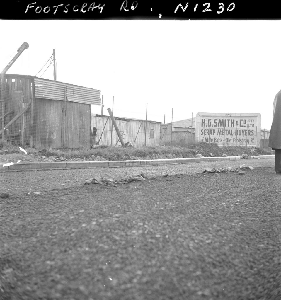 N1230 Image showing a dip in the kerb due to a trench drain, during construction of Footscray Road