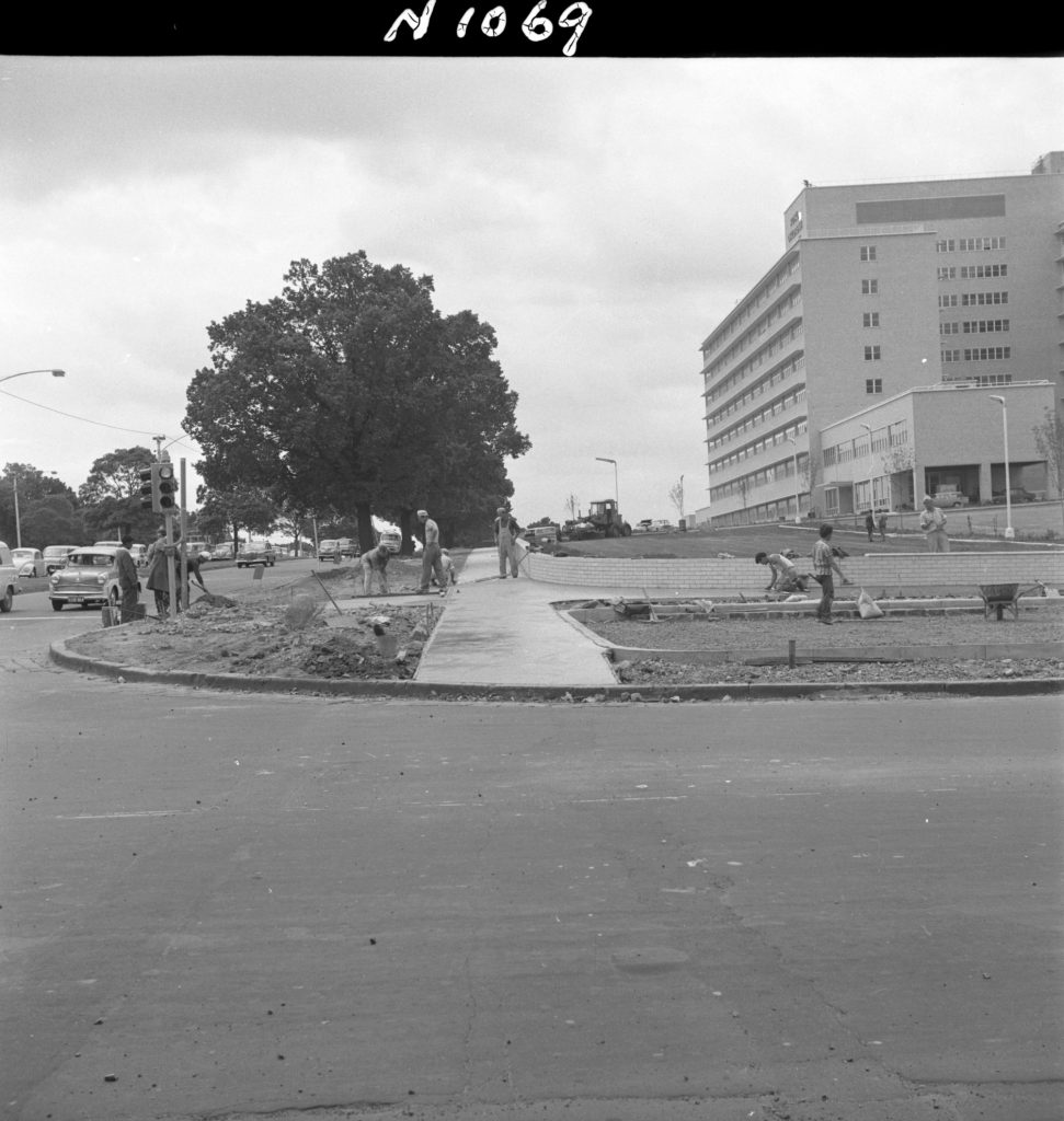 N1069 Image showing construction of a concrete footpath at the Royal Children’s Hospital on Gatehouse Street and Flemington Road