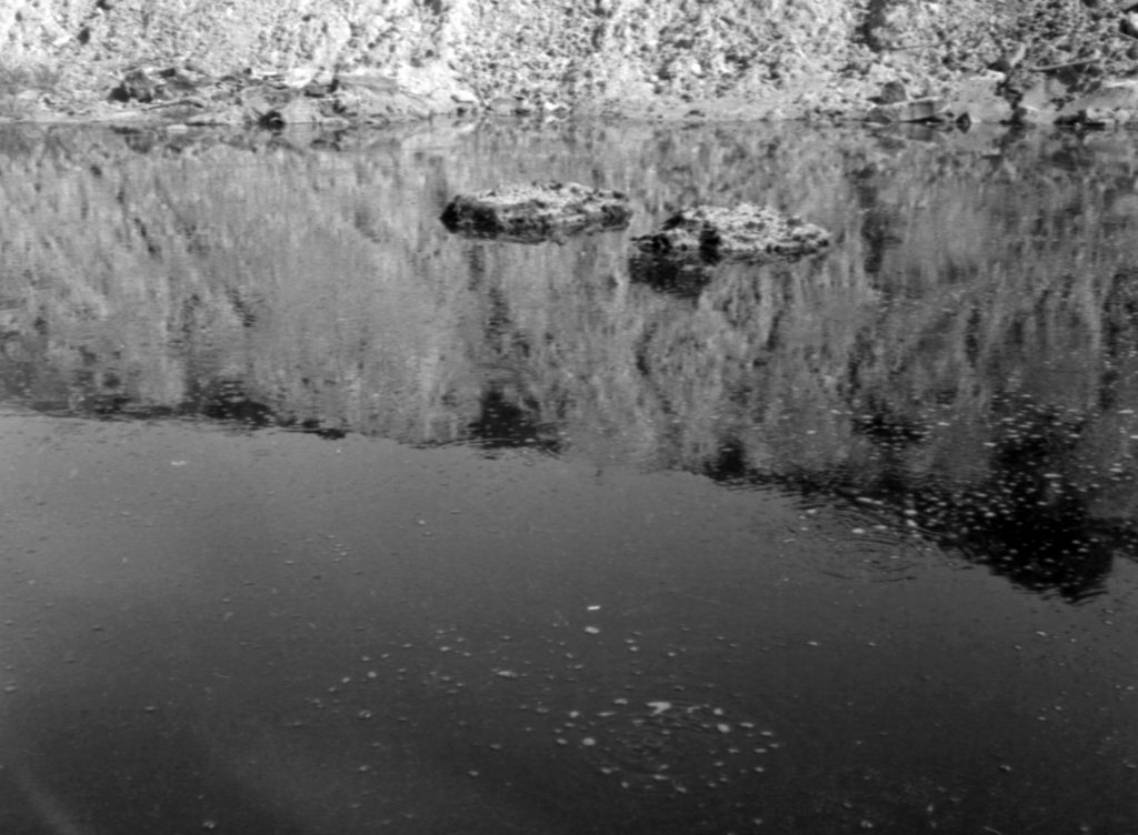 N1006 Image of Melbourne City Council tip, showing gas bubbles from refuse under the water