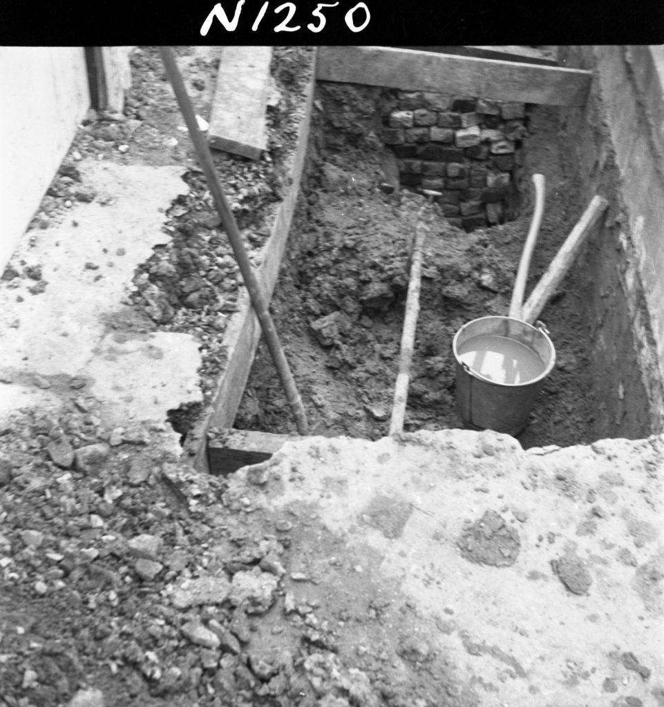 N1250 Image showing an Engineering Services Department trench in a Flinders Street footpath