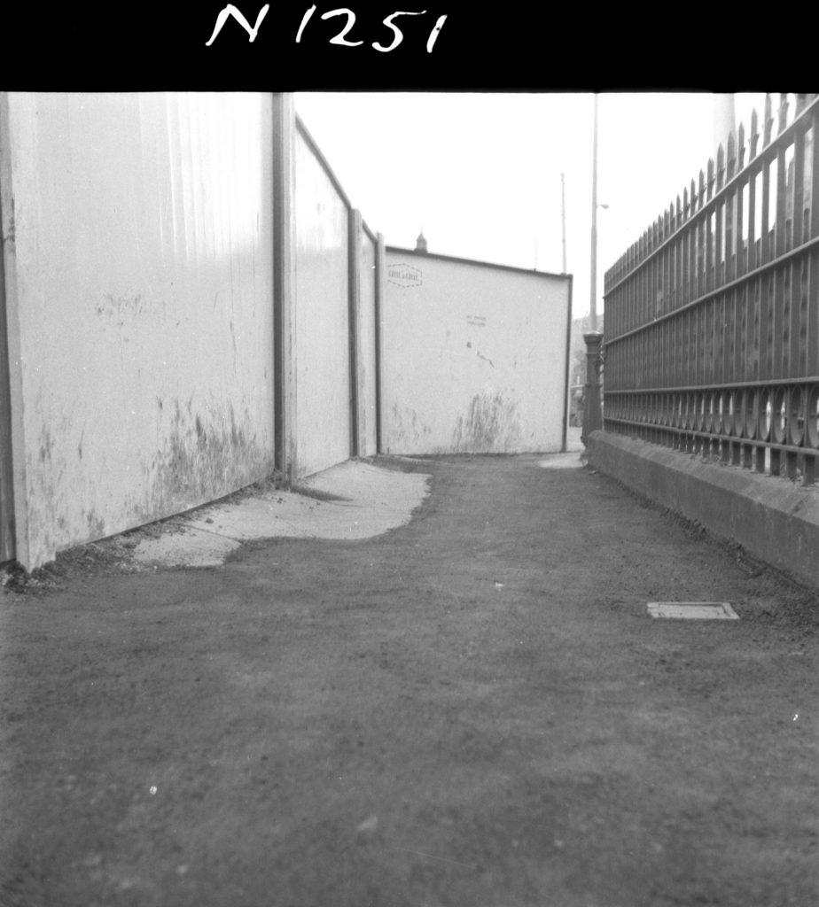 N1251 Image showing reinstatement of an Engineering Services Department trench in a Flinders Street footpath