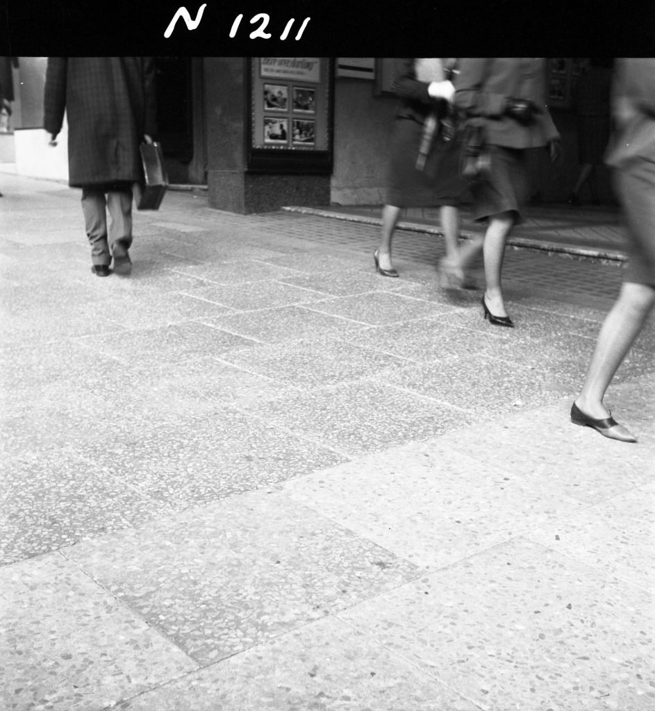 N1211 Image showing 24″ variegated stone concrete slabs on Collins Street