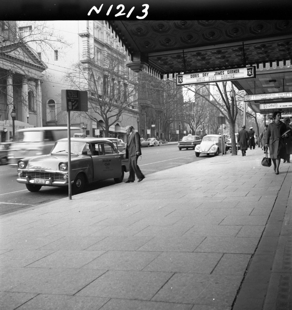 N1213 Image showing 24″ variegated stone concrete slabs on Collins Street