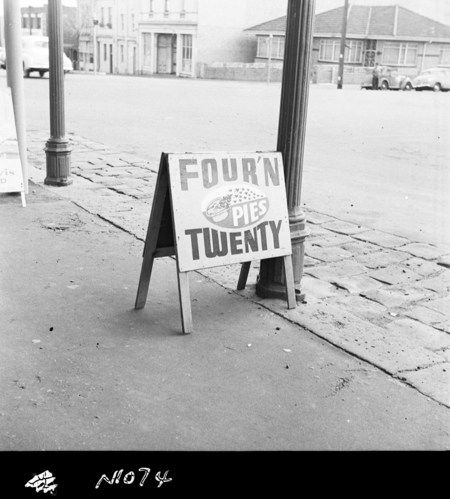 N1074 Image showing a footpath obstruction (Four N’ Twenty pies sign)