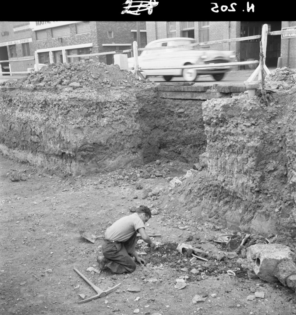 N205 Image showing cutting and sealing of an old drain to a sewer during construction of a weighbridge on Flinders Street