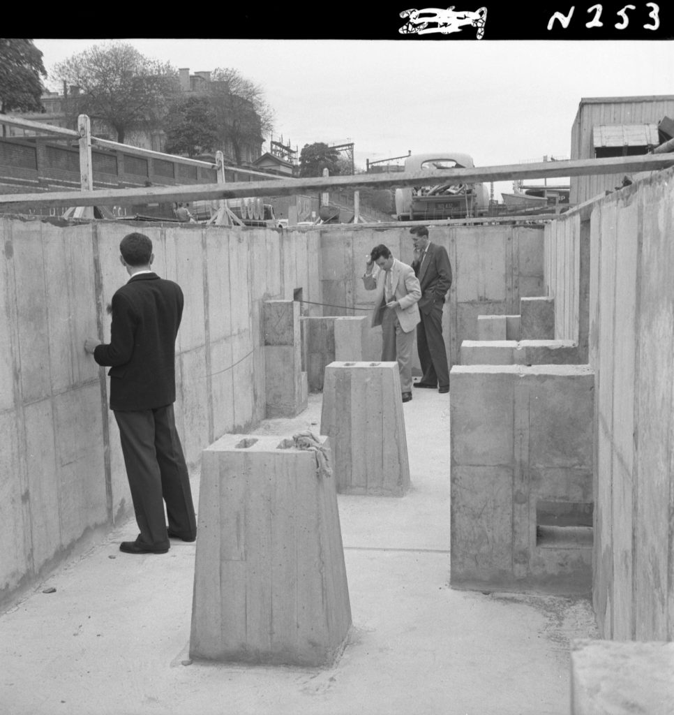 N253 Image showing checking of internal dimensions during construction of a weighbridge on Flinders Street