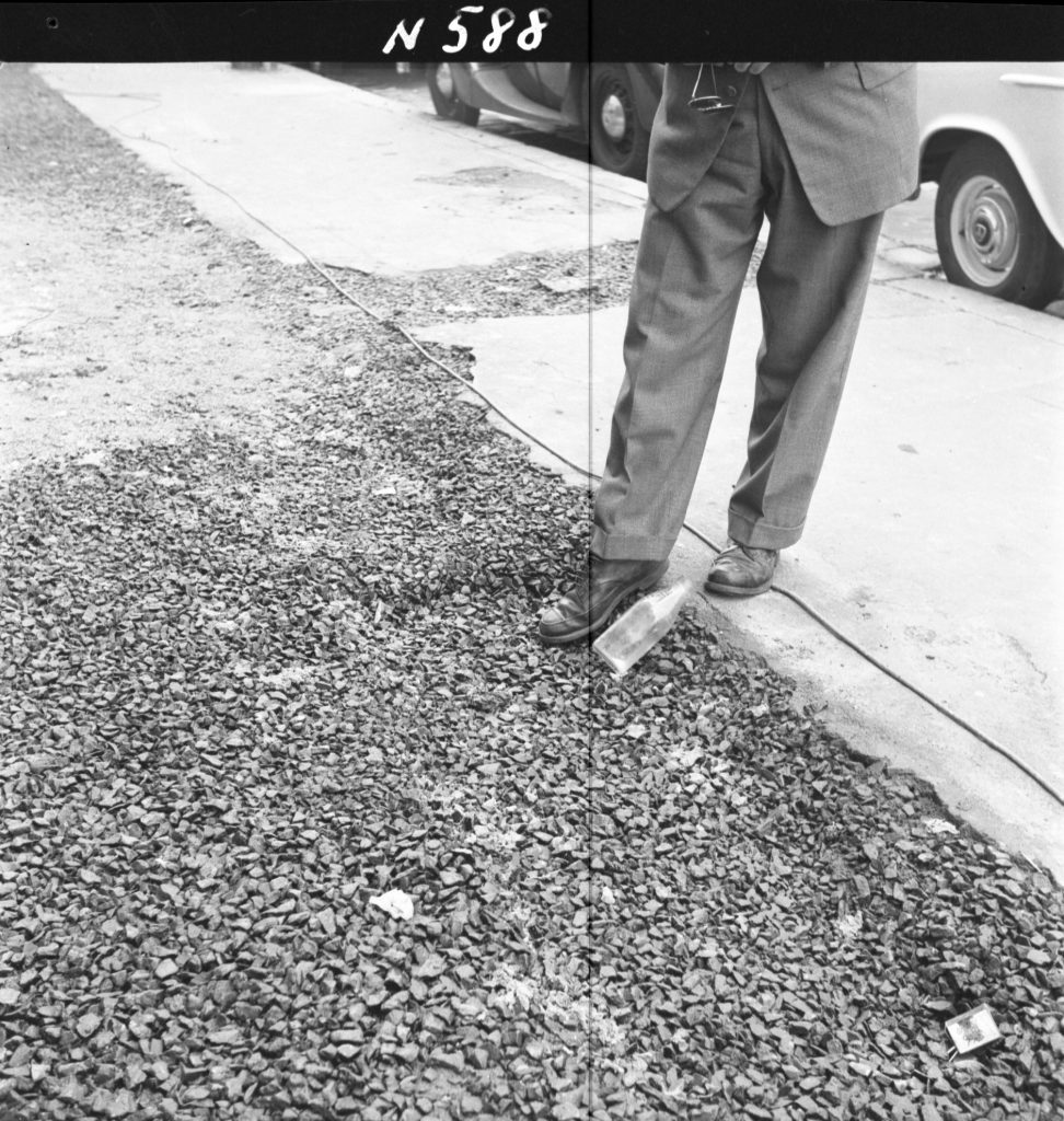 N588 Image showing footpath opening for the Postmaster-General trench near the corner of Albert Street and Lansdowne Street, East Melbourne