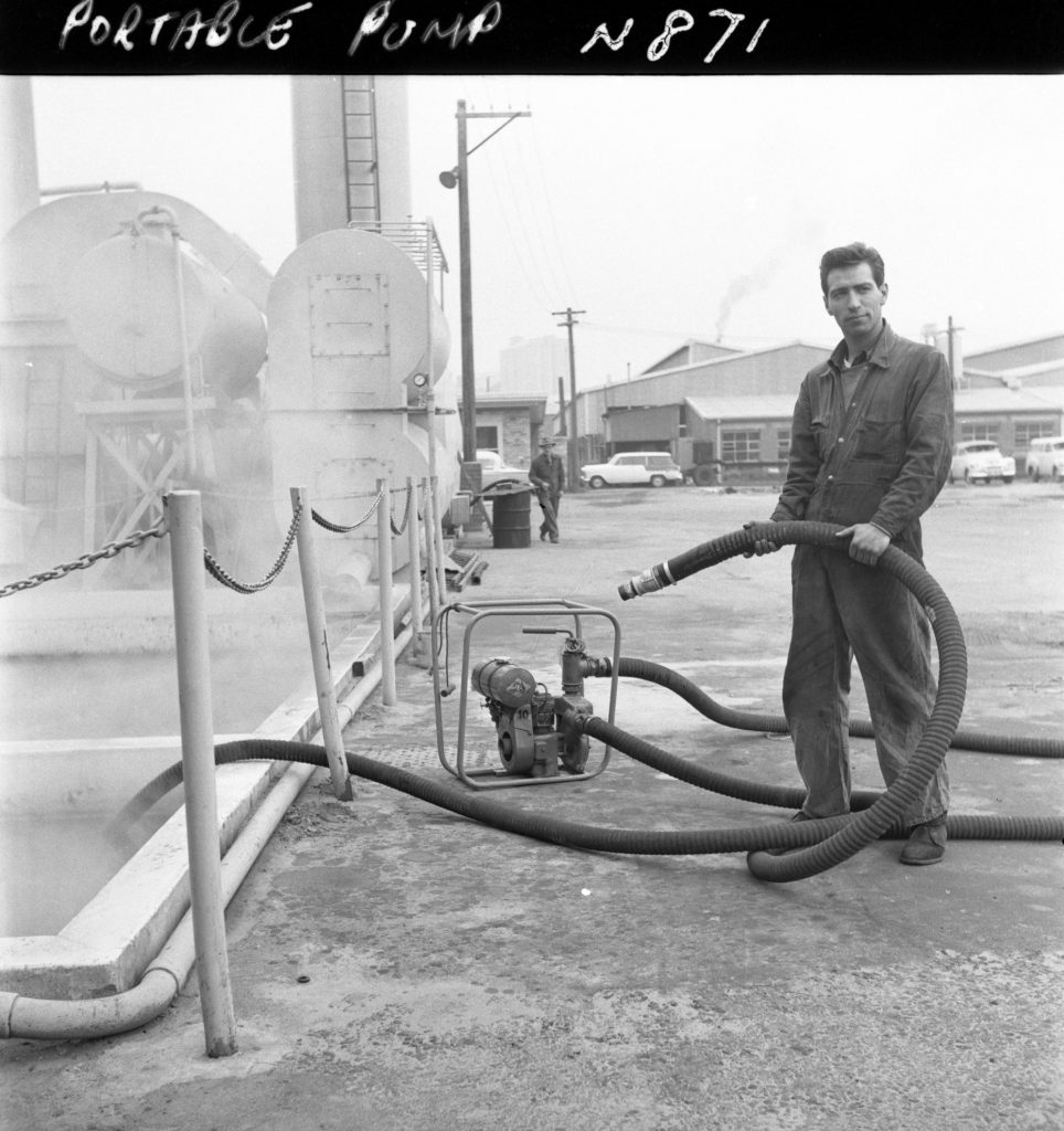 N871 Image showing a portable pump being tested by the Cleansing Department, on Green Street