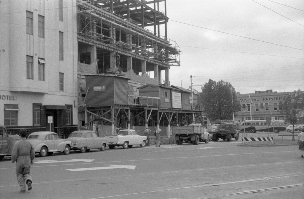 35A-12a Image showing obstructing cars at a construction site for The National Bank