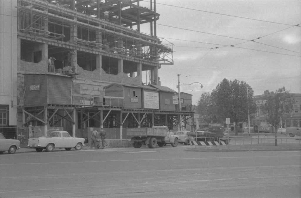 35A-12b Image showing obstructing cars at a construction site for The National Bank